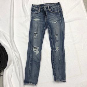 Blue distressed skinny jean